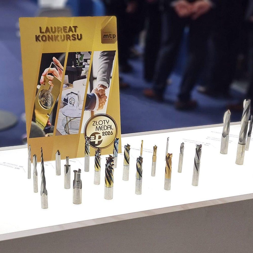 ITA Tools router bits and the MTP Group competition winner board at DREMA